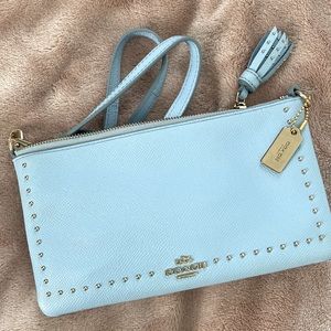 Coach light blue cross body